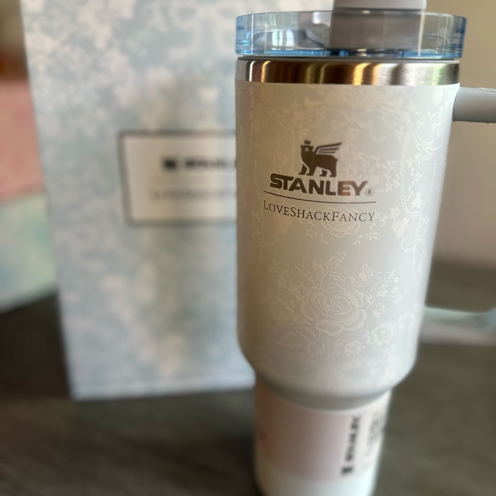 White Floral Tumbler with Blue Lid